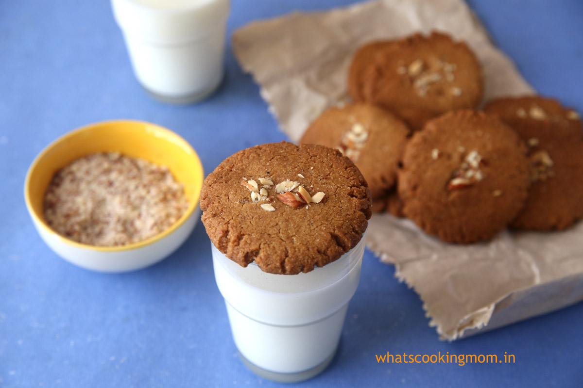 Milk and eggless whole wheat almond Cookies served on a brown paper bag
