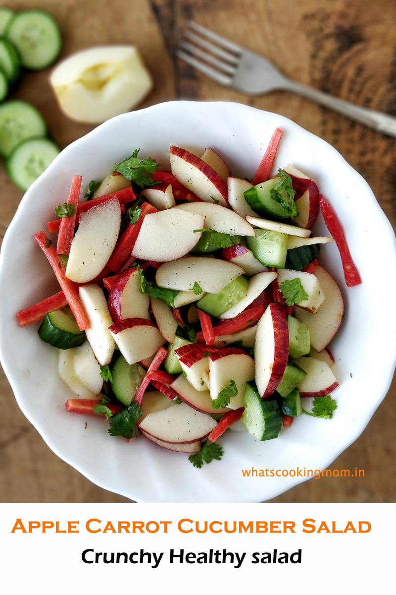 Apple carrot cucumber salad served in a white bowl