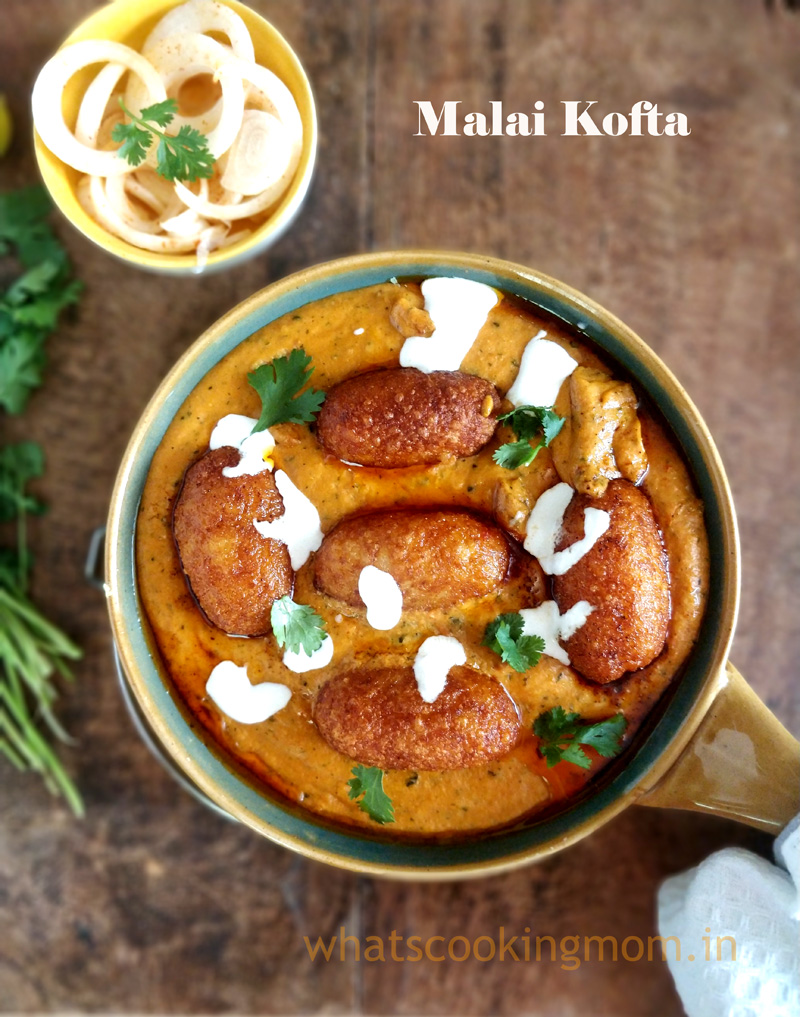 Malai Kofta indian curry served in a bowl