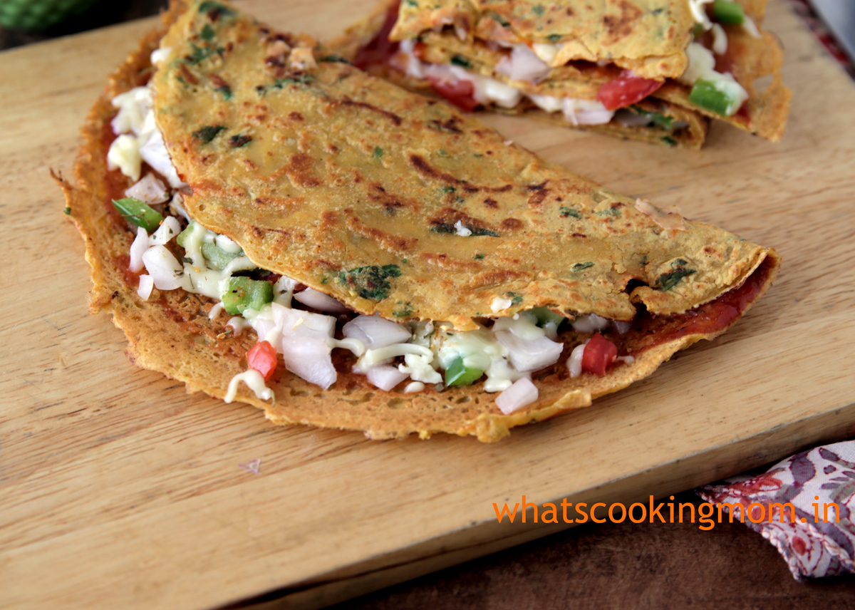 Besan cheela stuffed with cheese and vegetables